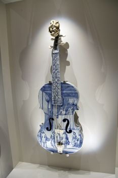 tile ceramics violin hold on the wall