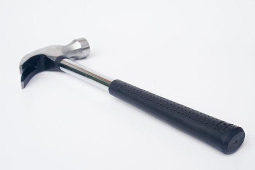 Black handled claw hammer against white background