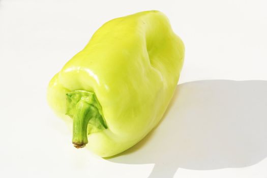 Green pepper against white background