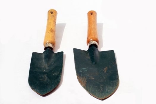 Two garden trowels against white background