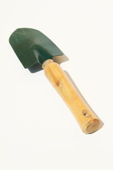 Garden shovel trowel against white background