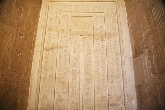 egyptian wall with hieroglyphic writings