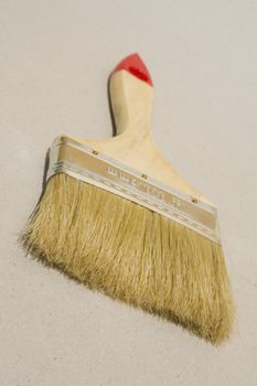 A set of paint brushes isolated against a plain background