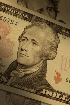 Close-up of a ten-dollar bill ($10), highlighting Alexander Hamilton.