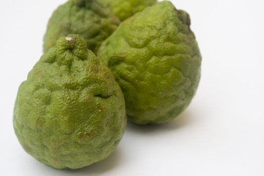 Kaffir limes isolated against a white background