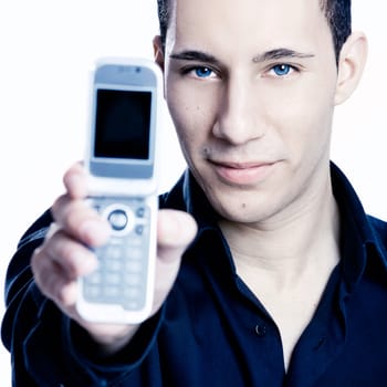 Young man showing a cell phone, toned in PS