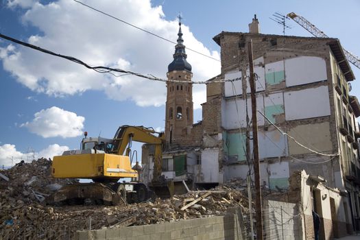 demolish bulding with an excavator at calatayud saragossa aragon spain