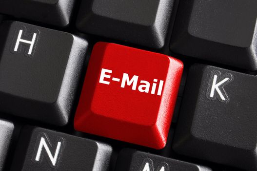 internet email communication concept with a button on computer keyboard