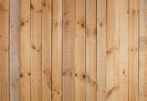 The surface of yellow rough wooden wall