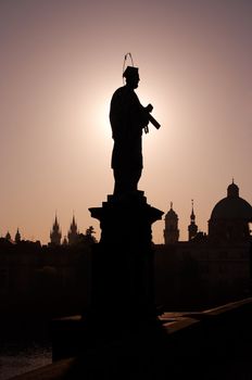 Statue of St John from Nepomuk in the Charles bridge at Prague