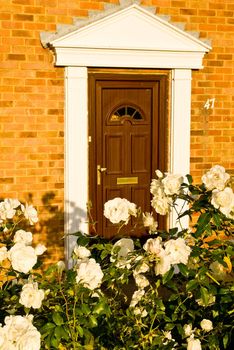 Entrance to a typical english house at sunset.