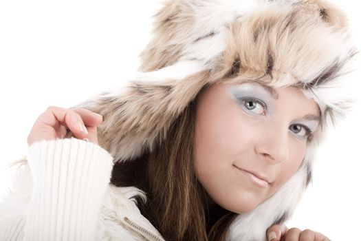 Young beautilful woman in fur hat