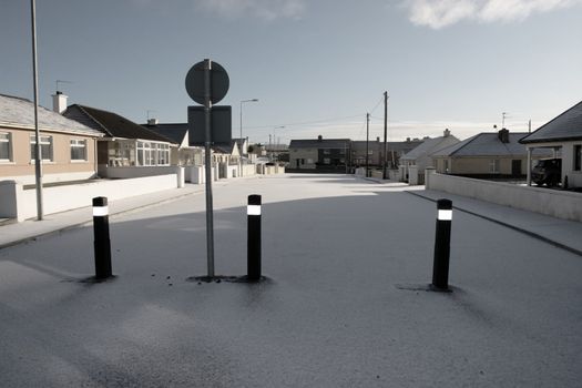a snowy covered town scene in ballybunion ireland