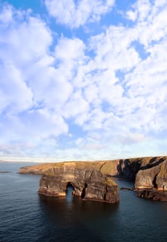 a view of the virgin rock in ballybunion ireland as seen from the cliffs on a calm winters day