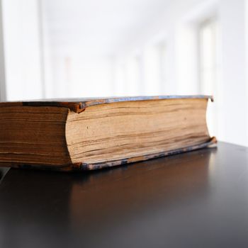 books in a library bookshelf for university education