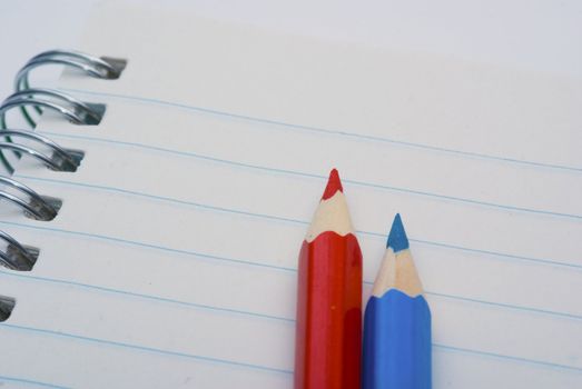 Closeup of colored crayons on white background