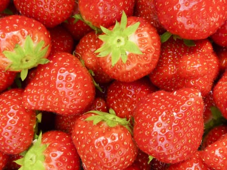 Closeup of delicious ripe strawberries on market stall