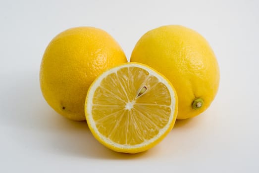 Fresh yellow lemons, isolated, white background