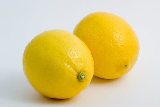 Fresh yellow lemons, isolated, white background