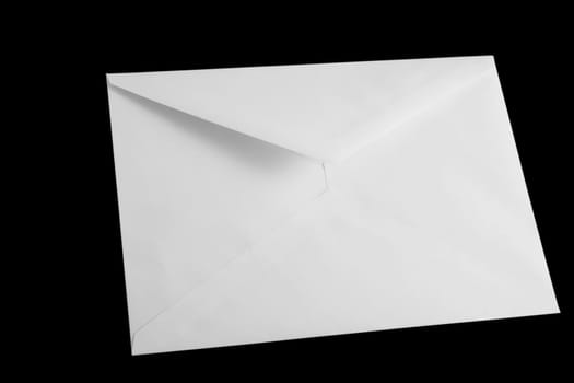 front view of white open envelop on black background