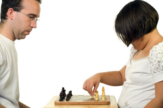 A father and his daughter playing a game of chess