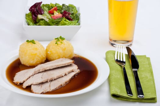 bavarian roasted pork dish with dumpling