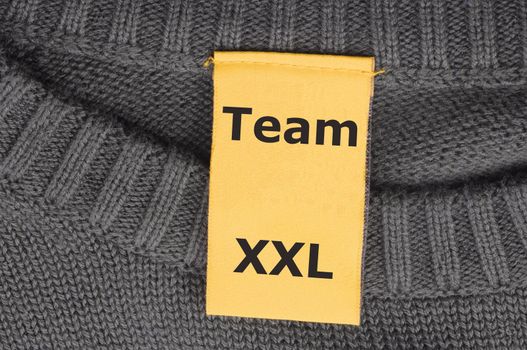 xxl team or teamwork concept with fashion label