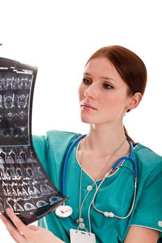 Female doctor looking at xray picture