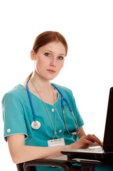 The young medical nurse with the laptop.