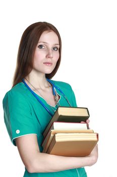 Portrait of female doctor with books