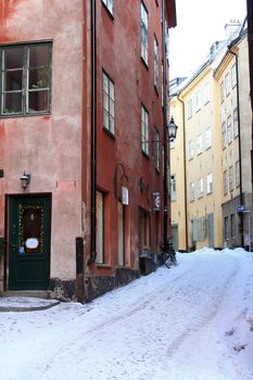 Tide and narrow street in Stockholm, Sweden. Winter.