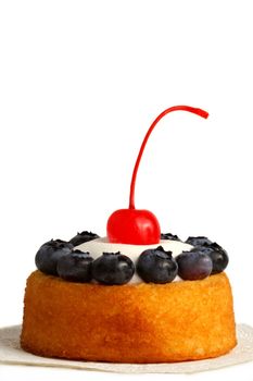 blueberry and cherry shortcake isolated on white background