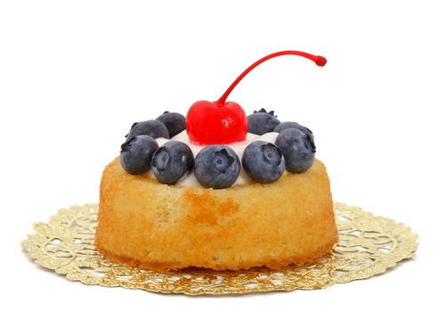 blueberry and cherry shortcake isolated on white background