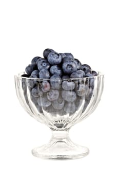fresh blueberries in transparent bowl, isolated on white