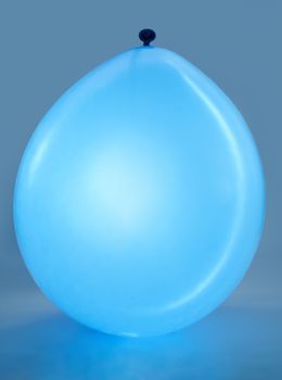 closeup on a luminous blue ballon 