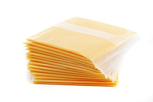 slices of cheese individually wrapped, isolated on white