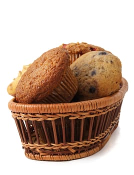basket of muffins, white background