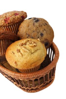 basket of muffins, white background