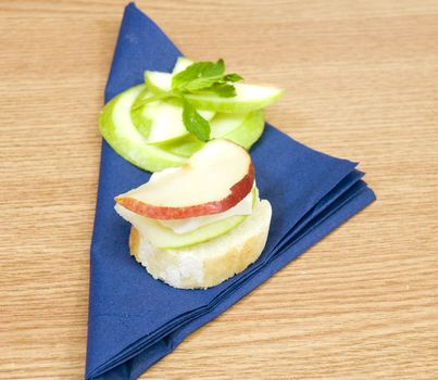 fresh baguette with tasty brie cheese and organic fruits