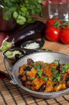 Indian dish with fried aubergine