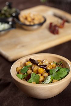 Delicious freshly made Indian starter with chickpeas and cilantro