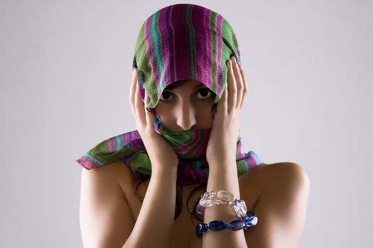 Sensual Cute Woman Covering Her Face With A Colorful Veil