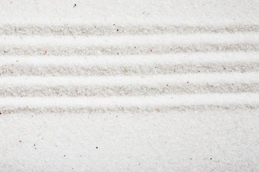 A pattern in white sand, background image