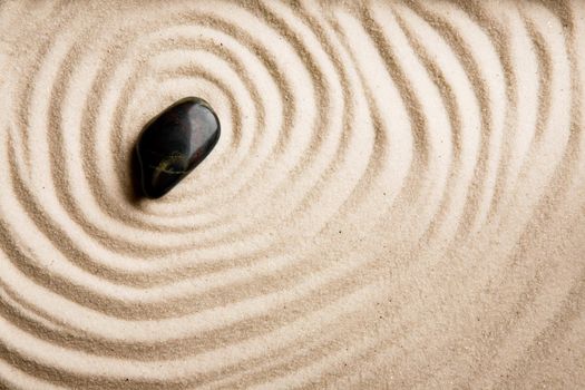 A circular sand swirl background texture abstract