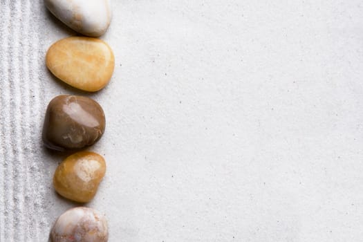 Rocks and sand on a beach style background