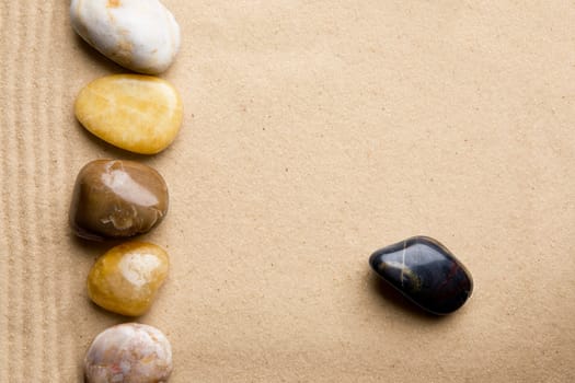 Rocks and sand on a beach style background