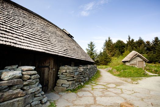 An old norwegian viking farm with two typical buildings