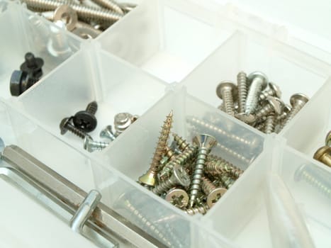 Tool box with screws and screwdriver