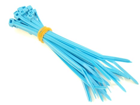 Blue plastic wire ties in bundle, on white background