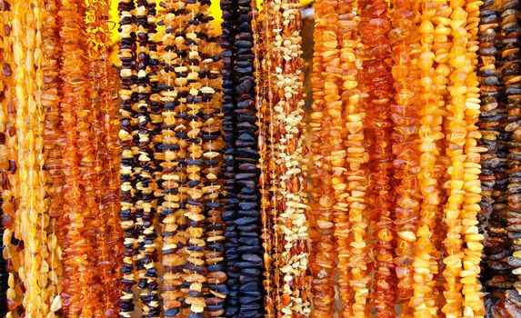 Background with beautiful necklets with amber